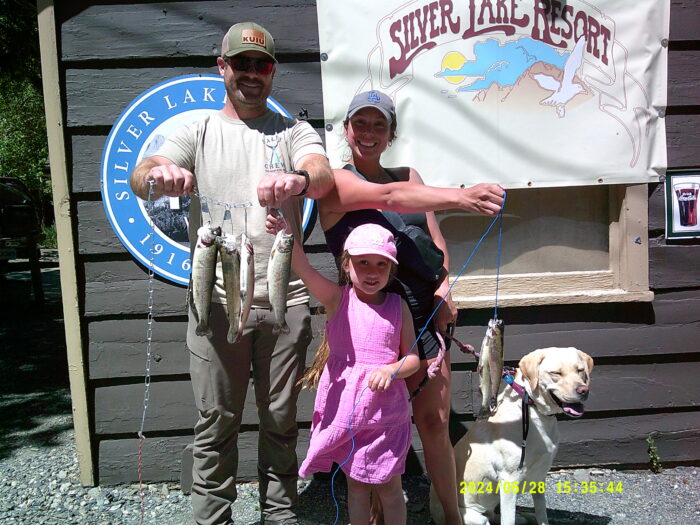Savannah Coker and Family with a nice 3 pound 1 oz plus a few caught from a boat on Silver Lake using Mice Tails