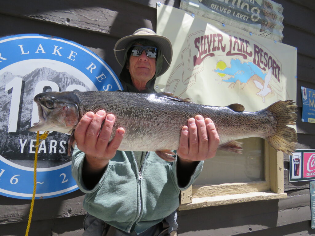 Jim D'Evelyn with a 6# Rainbow caught from the shore of Silver Lake using a KastMaster