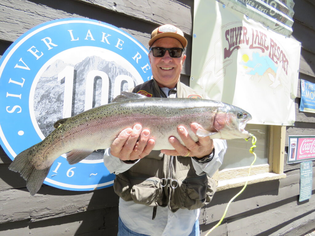 Jim Vieau of Newport Beach with a nice 4# 13oz Rainbow caught from the shore of Silver Lake using Berkley Power Bait