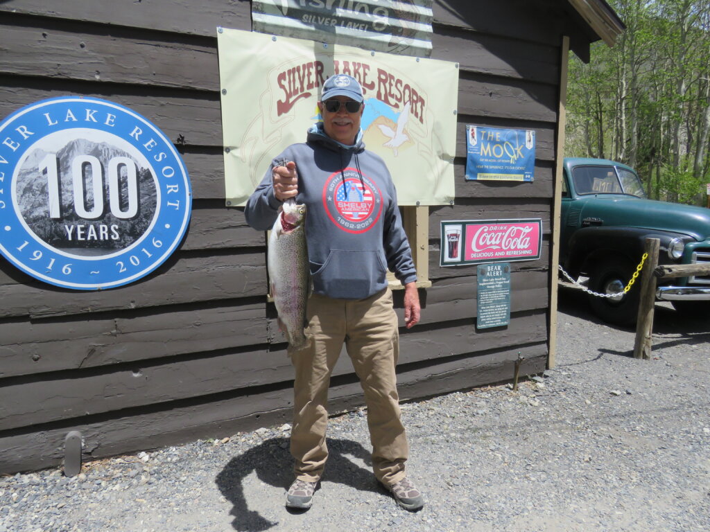 Rich Bailey of Davis with a 4# 6oz Rainbow caught from a boat on Silver Lake using Berkley Power Bait